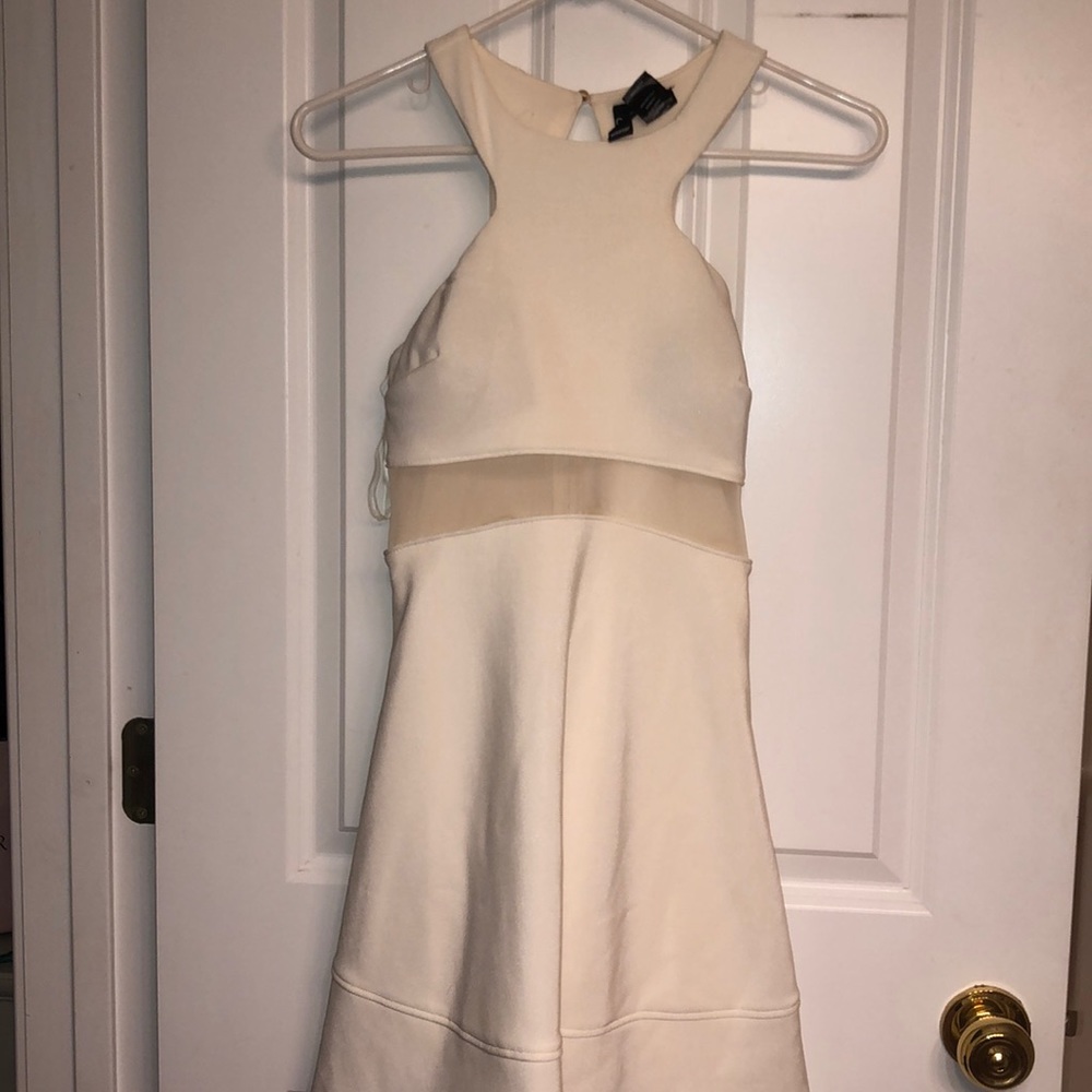 super cute white dress with a mesh midline